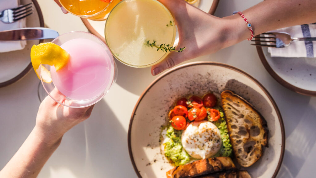 Drinks and food at The Jimmy, one of the best brunch spots in Charlotte, NC